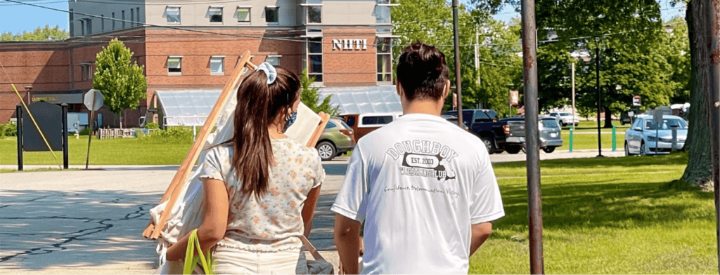 Two students moving into residence halls on NHTI's campus