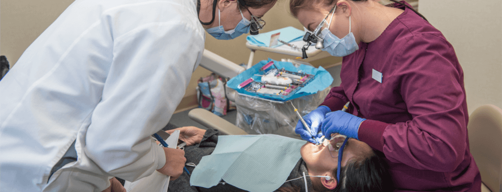 Student and instructor work together in NHTI's Dental Clinic