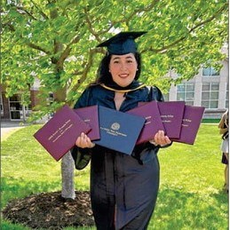 Keillys Guerrero, displaying her degrees.