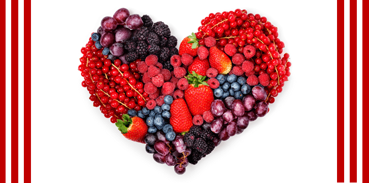 a heart made out of berries