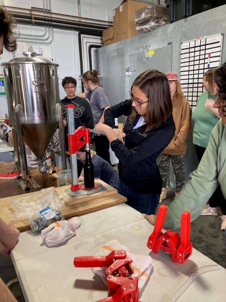 NHTI Chemistry students brew beer at Feathered Friend Brewery in Concord
