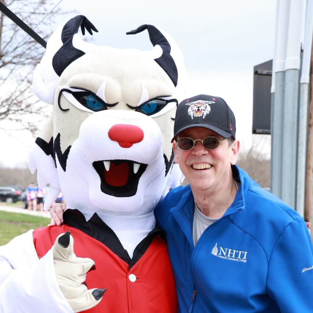 President Tompkins with Leroy the Lynx mascot