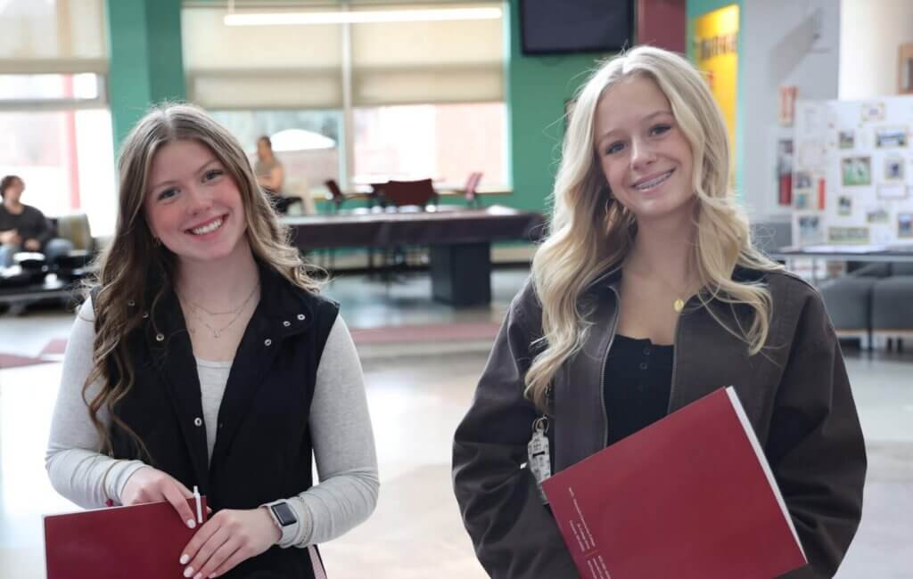 Two female students at orientation event