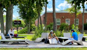 Students studying outdoors on NHTI campus