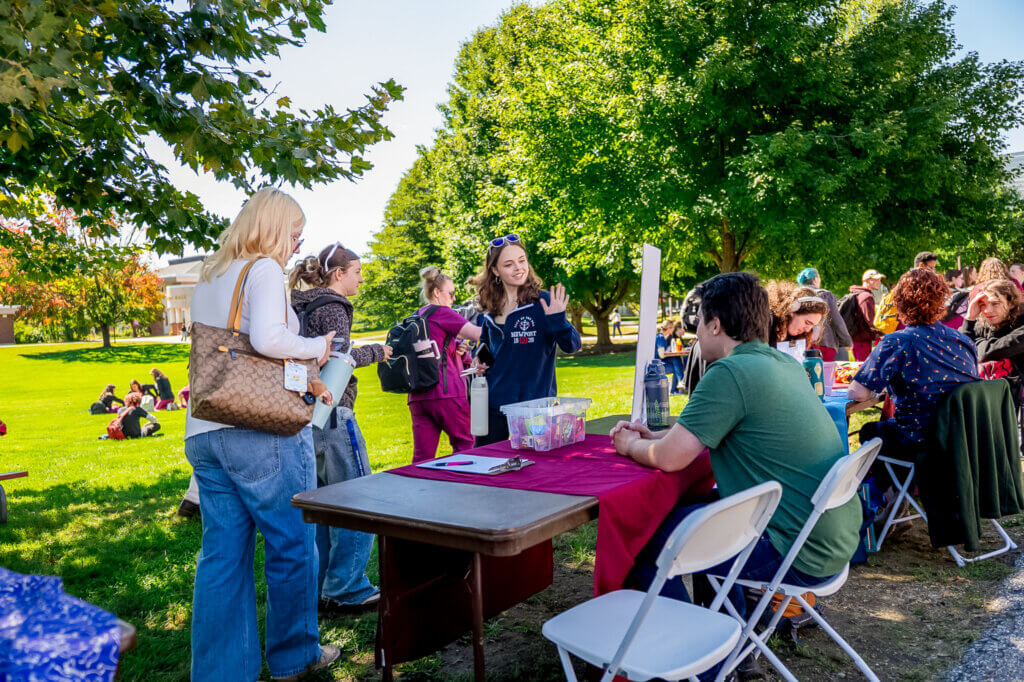 NHTI students outdoors at club fair